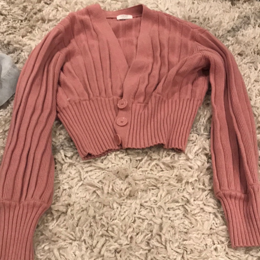 Beautiful Aritzia sweater . Very sexy and low cut